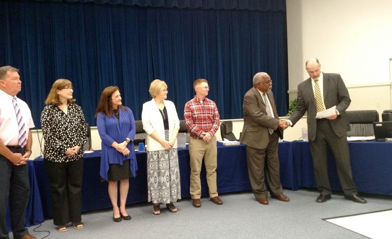 School Board honors retiring Principal James Barlow