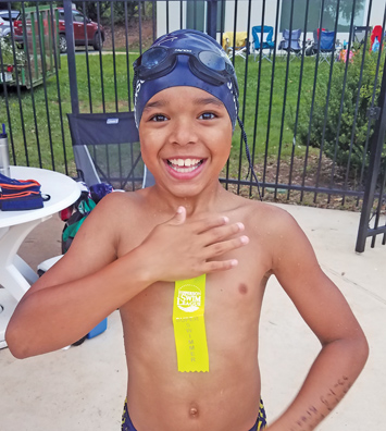 Makos set individual records in swim meet