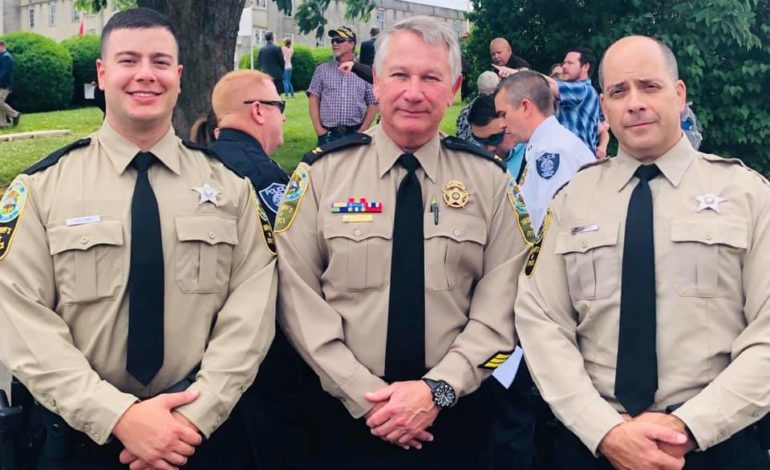 Two graduate from law enforcement academy