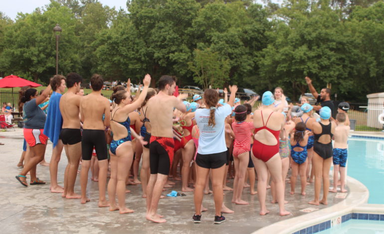 Sharks kick off swim season with new head coach
