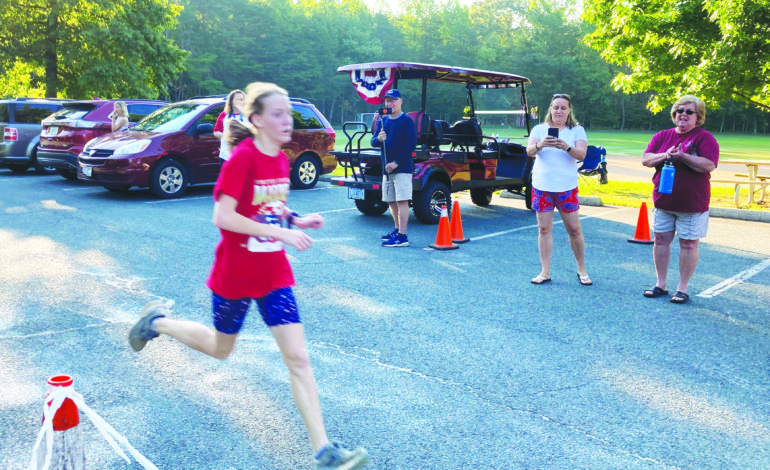 Repeat winners in Lake Monticello Spirit 5k and Lake swim