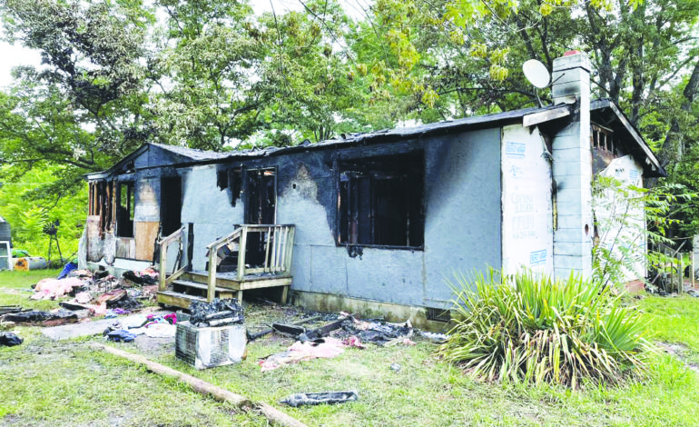 Deputies injured rescuing elderly woman trapped in house fire