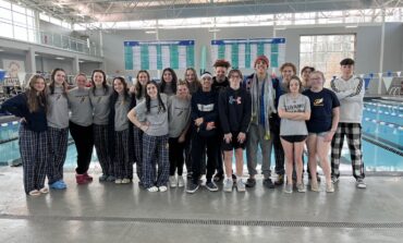 Fuller and Robinson regional champs for swim and dive team 