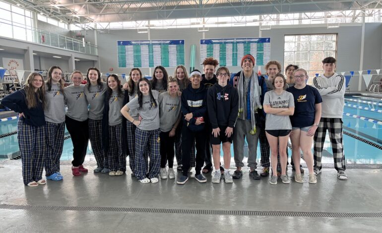 Fuller and Robinson regional champs for swim and dive team 