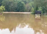 High water damages Pleasant Grove bridge