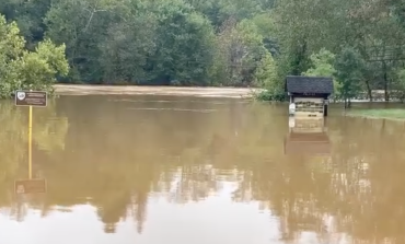 High water damages Pleasant Grove bridge