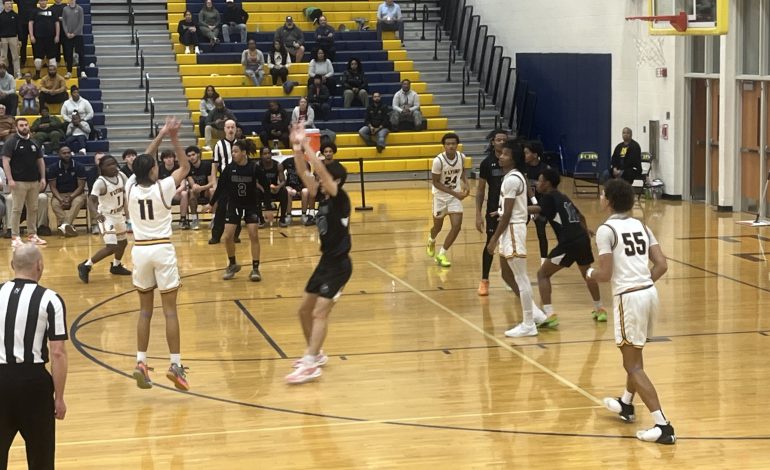 Fluco boys win home opener in overtime 56-52