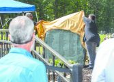 Memorial dedicated listing names of people buried at Oak Hill