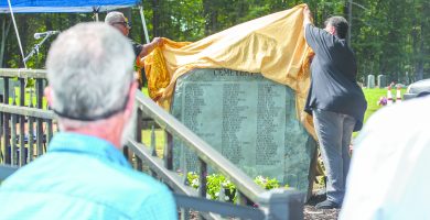 Memorial dedicated listing names of people buried at Oak Hill