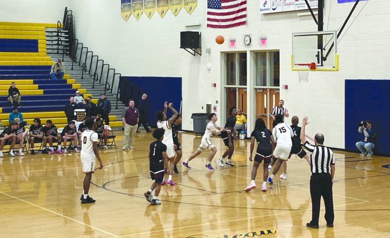 Fluco boys outlasted by Lancers from Amherst 56-55