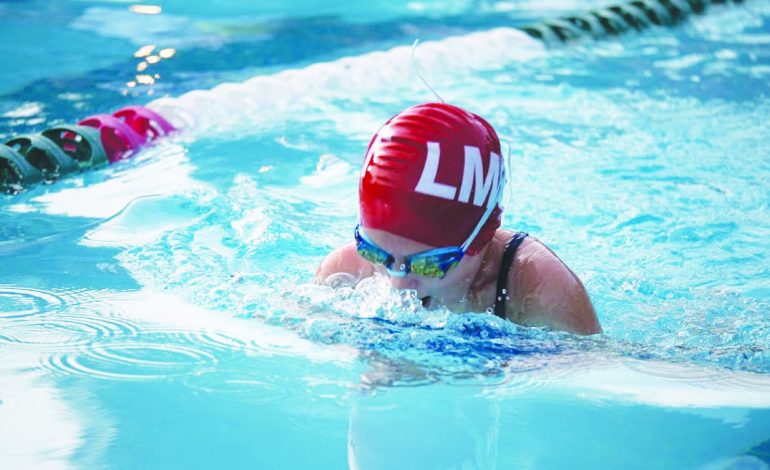 Sharks swimmers shine despite loss to Frogs